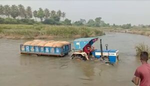 tractor crossing river