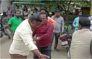 Chikkaballapur Man assaults village assistant saaksha tv